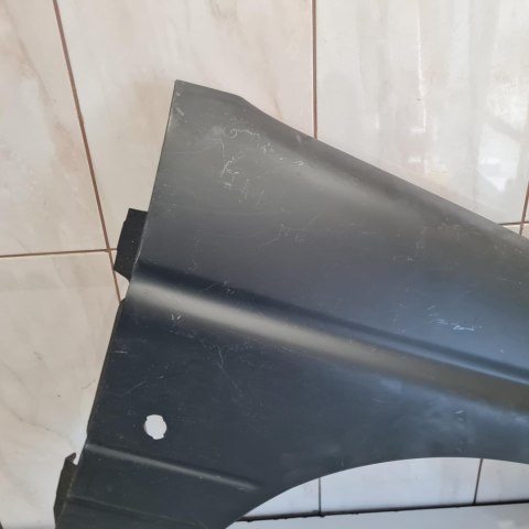 FORD ESCORT ORION BŁOTNIK PRAWY PRZÓD PRZEDNI