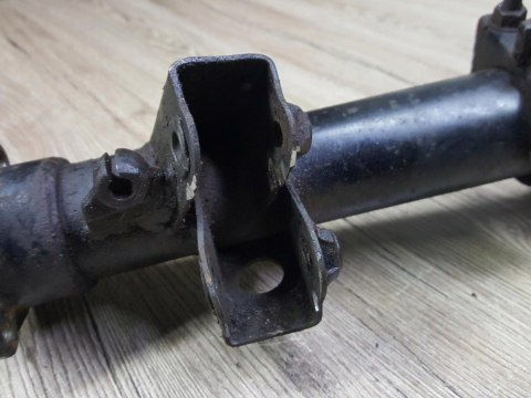 KAWASAKI KLF 300 A OBUDOWA PÓŁOSI MOCOWANIE PIASTY